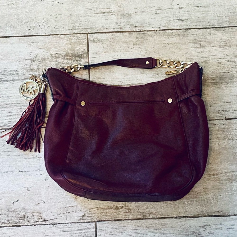 Michael Kors burgundy wine leather fringe shoulder bag